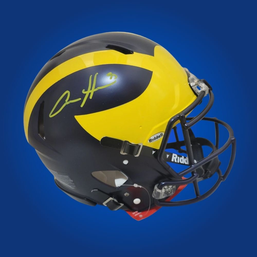 Autographed Michigan Wolverines full size Authentic Helmet signed by Aidan Hutchinson, displayed against a white background for product clarity. SportsMarkets product photo.