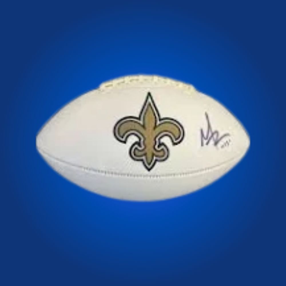 Alvin Kamara-signed New Orleans Saints football, showing team logo and player autograph.