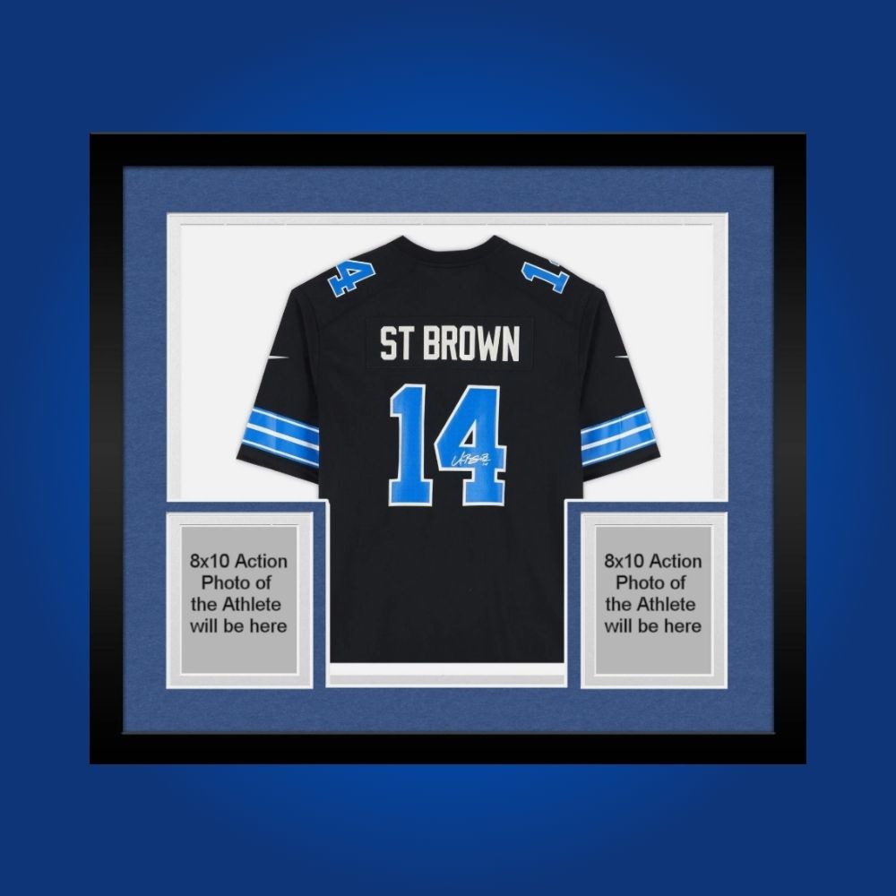 Framed Detroit Lions jersey signed by Amon-Ra St. Brown with action photos and Certificate of Authenticity