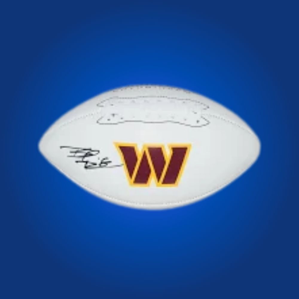 Brian Robinson Jr. signed Commanders logo football, displaying running back’s signature and team branding.