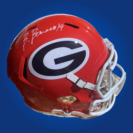 Autographed Georgia Bulldogs full size replica helmet signed by Brock Bowers, displayed on a clean white background. SportsMarkets exclusive photo.