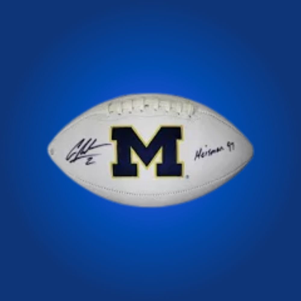 Charles Woodson autographed Michigan Wolverines white logo football, premium memorabilia for Wolverines fans and sports collectors.