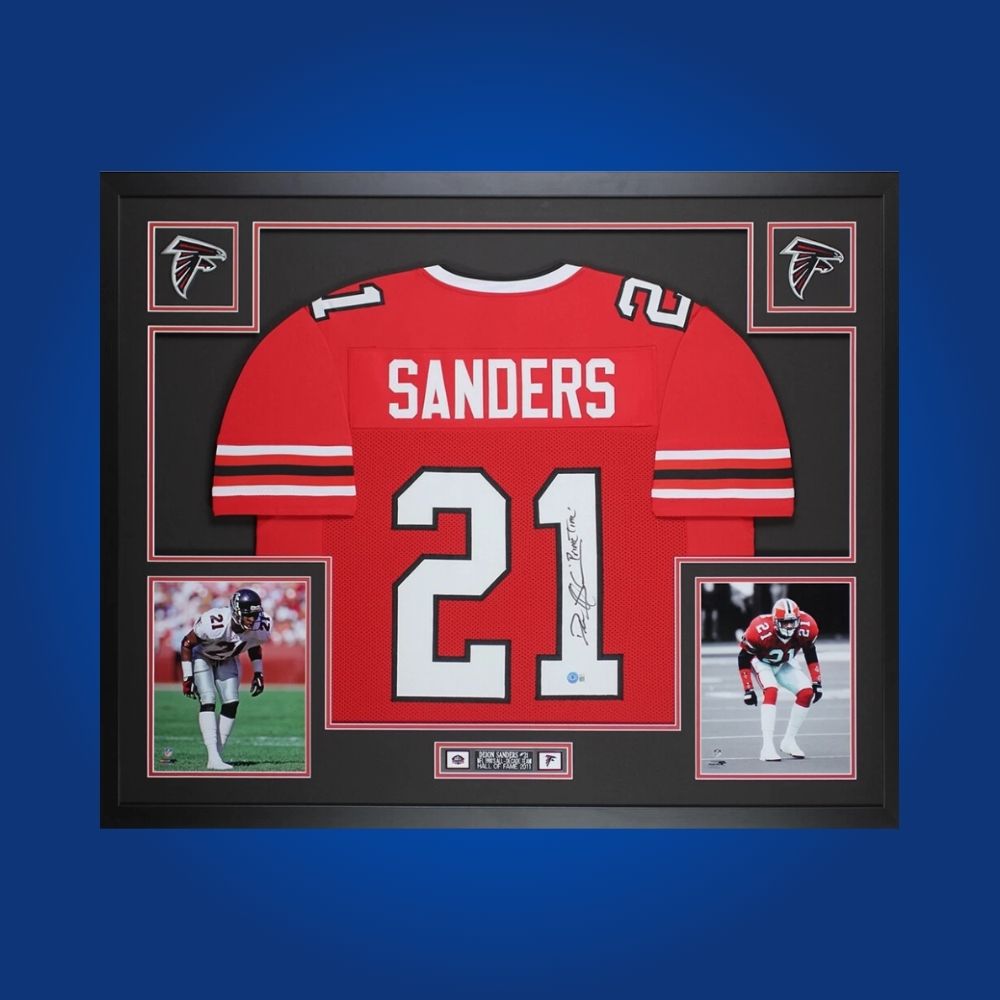 Framed Atlanta Falcons jersey signed by Deion Sanders with action photos and Certificate of Authenticity