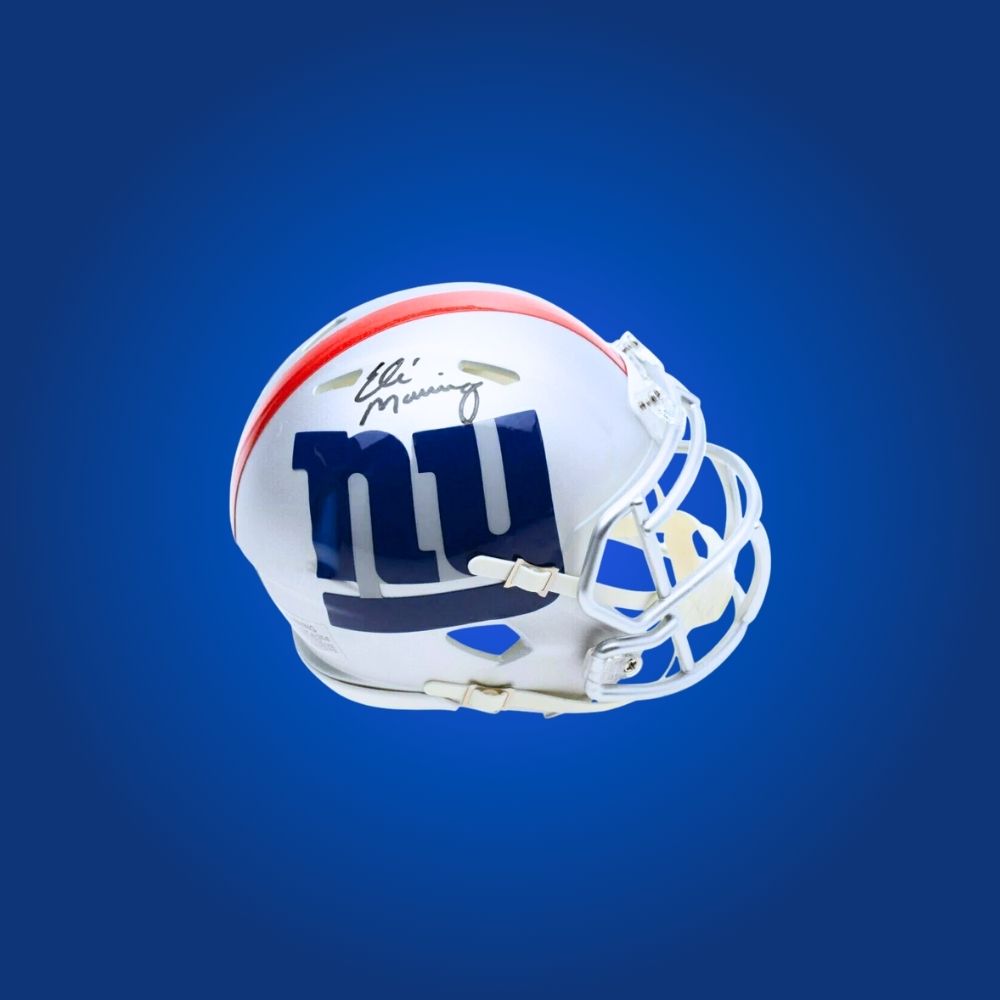 New York Giants mini helmet signed by Eli Manning with Certificate of Authenticity.
