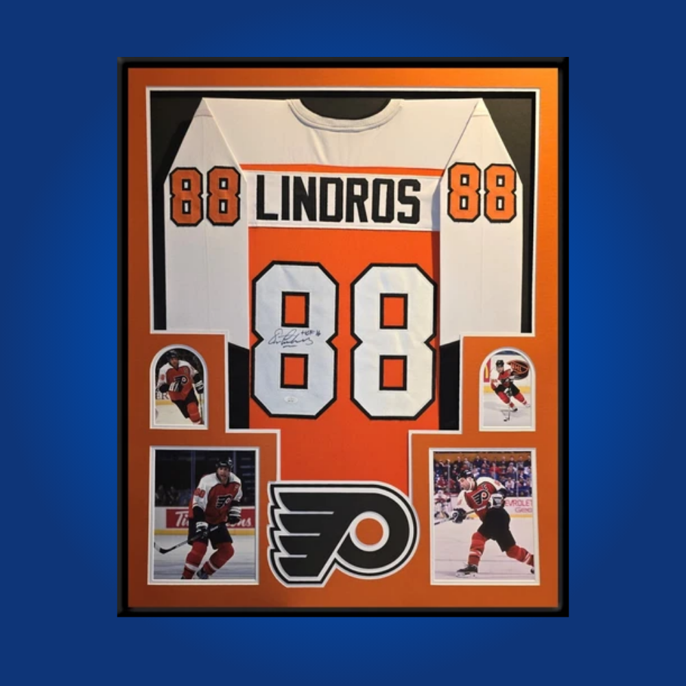 Eric Lindros’ signed full framed Philadelphia Flyers white jersey is an iconic collectible, commemorating the legendary power forward’s impact and his era-defining presence in Philadelphia.