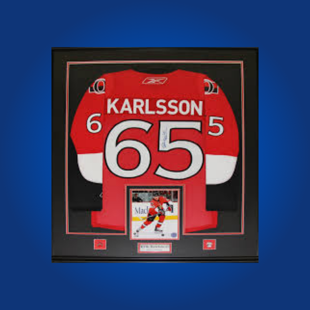 Erik Karlsson’s signed full framed Ottawa Senators red jersey is a standout collectible, celebrating the Norris Trophy-winning defenseman’s legacy and unforgettable moments in Ottawa.