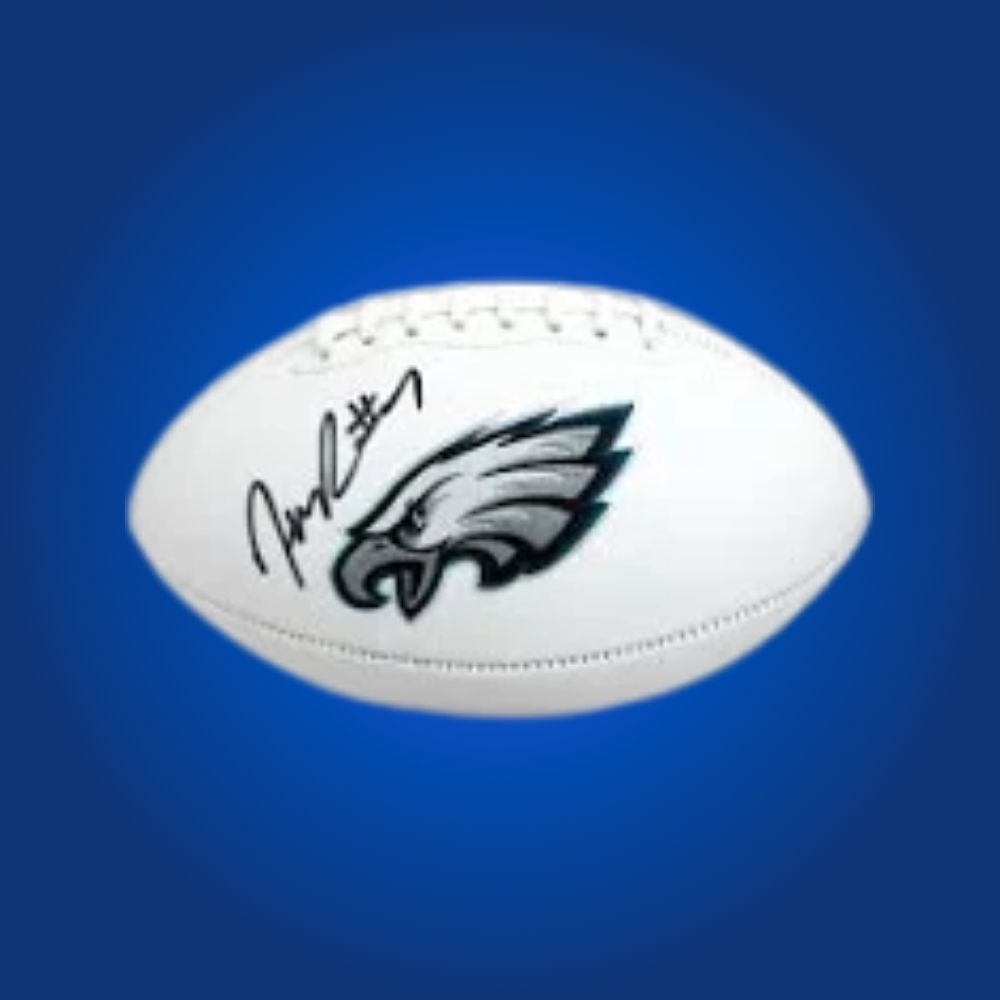 Haasan Reddick signed Eagles logo football, signature on white panel with team emblem.