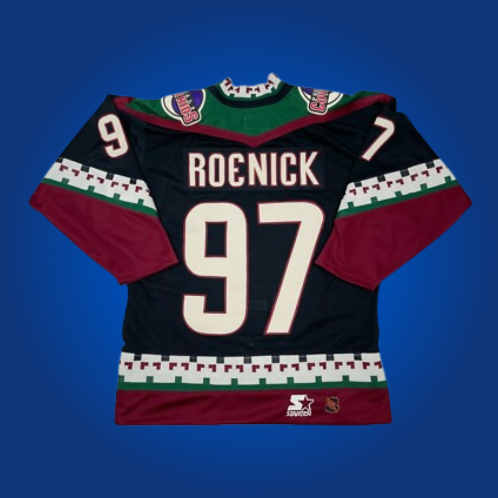 Jeremy Roenick’s HOF white custom jersey, signed and ready for display. A standout piece for fans and collectors, honoring Roenick’s career with the Coyotes and his Hall of Fame induction.