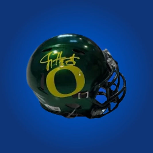 Joey Harrington signed Oregon Ducks mini helmet—ideal collectible for Ducks fans and Harrington memorabilia seekers.
