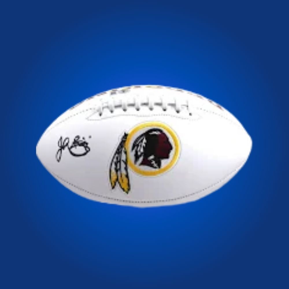 John Riggins signed Commanders logo football, showcasing Super Bowl MVPâs signature and team branding.