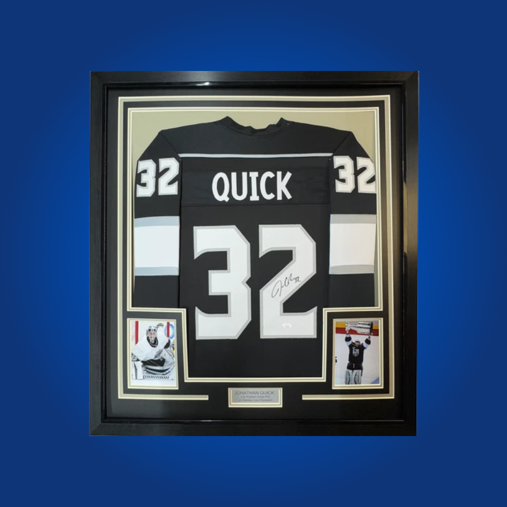Jonathan Quick’s autographed full framed Los Angeles Kings black jersey celebrates the star goaltender’s remarkable career, including multiple Stanley Cup runs, and is an outstanding display piece.