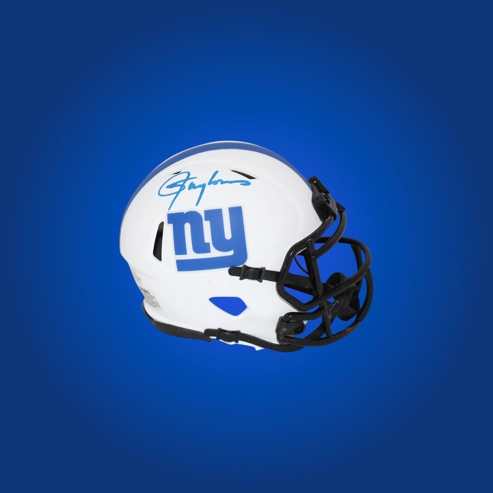 New York Giants mini helmet signed by Lawrence Taylor with Certificate of Authenticity.