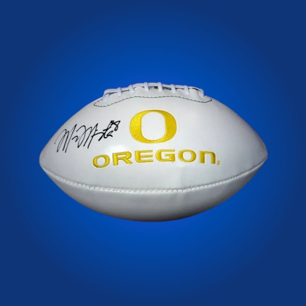 Marcus Mariota autographed Oregon Ducks white logo football, special memorabilia for dedicated Oregon supporters and collectors.