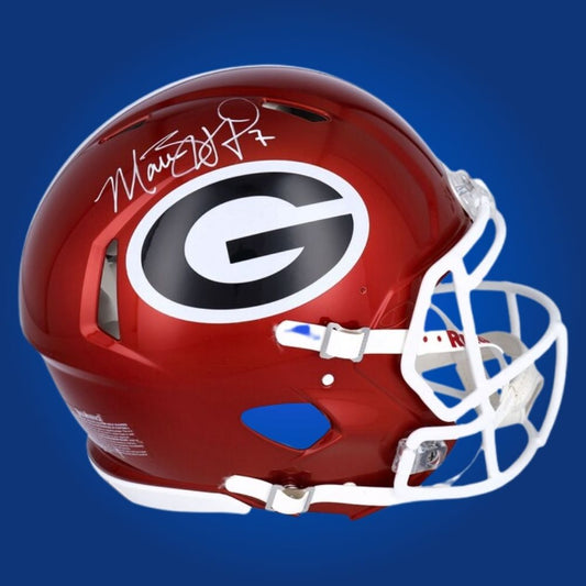 Autographed Georgia Bulldogs full size Authentic Helmet signed by Matthew Stafford, featured on a white backdrop. SportsMarkets exclusive product image.