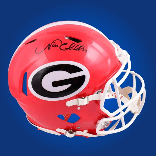 Autographed Georgia Bulldogs full size Authentic Helmet signed by Nick Chubb, presented on a white display background. SportsMarkets memorabilia photo.