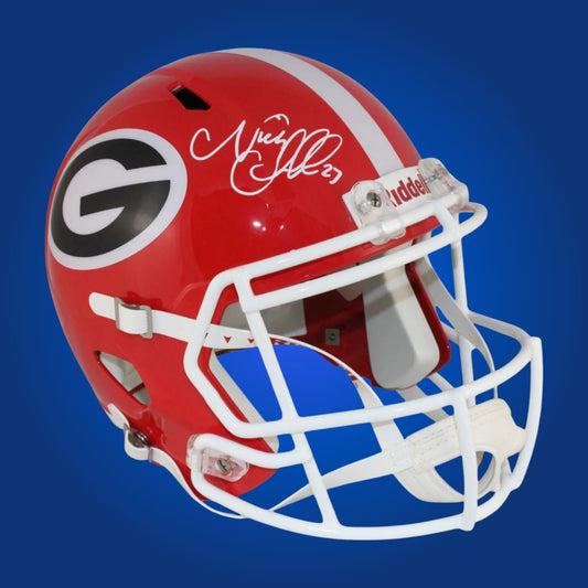 Autographed Georgia Bulldogs full size replica helmet signed by Nick Chubb, presented on a white display background. SportsMarkets memorabilia photo.