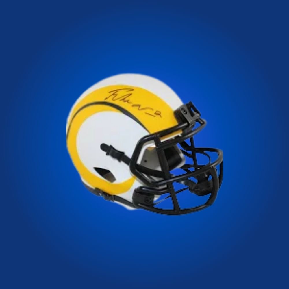 Los Angeles Rams mini helmet signed by Puka Nucua with Certificate of Authenticity.