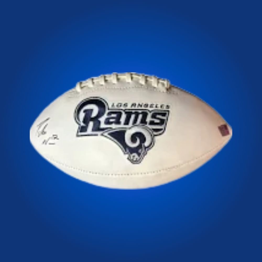 Puka Nacua signed Los Angeles Rams logo football, an exceptional collectible for Rams fans and NFL memorabilia aficionados, certified authentic and ideal for display.