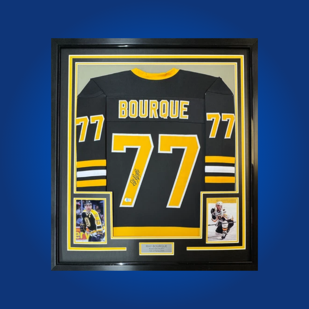 Hall of Famer Ray Bourque’s autograph on this full framed Boston Bruins jersey creates a striking collectible, celebrating a defensive legend’s storied career and connection to Boston.