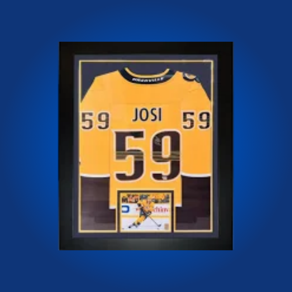 Roman Josi’s signed full framed Nashville Predators yellow jersey is a premier collectible, commemorating the captain’s exceptional leadership and impact in Nashville.