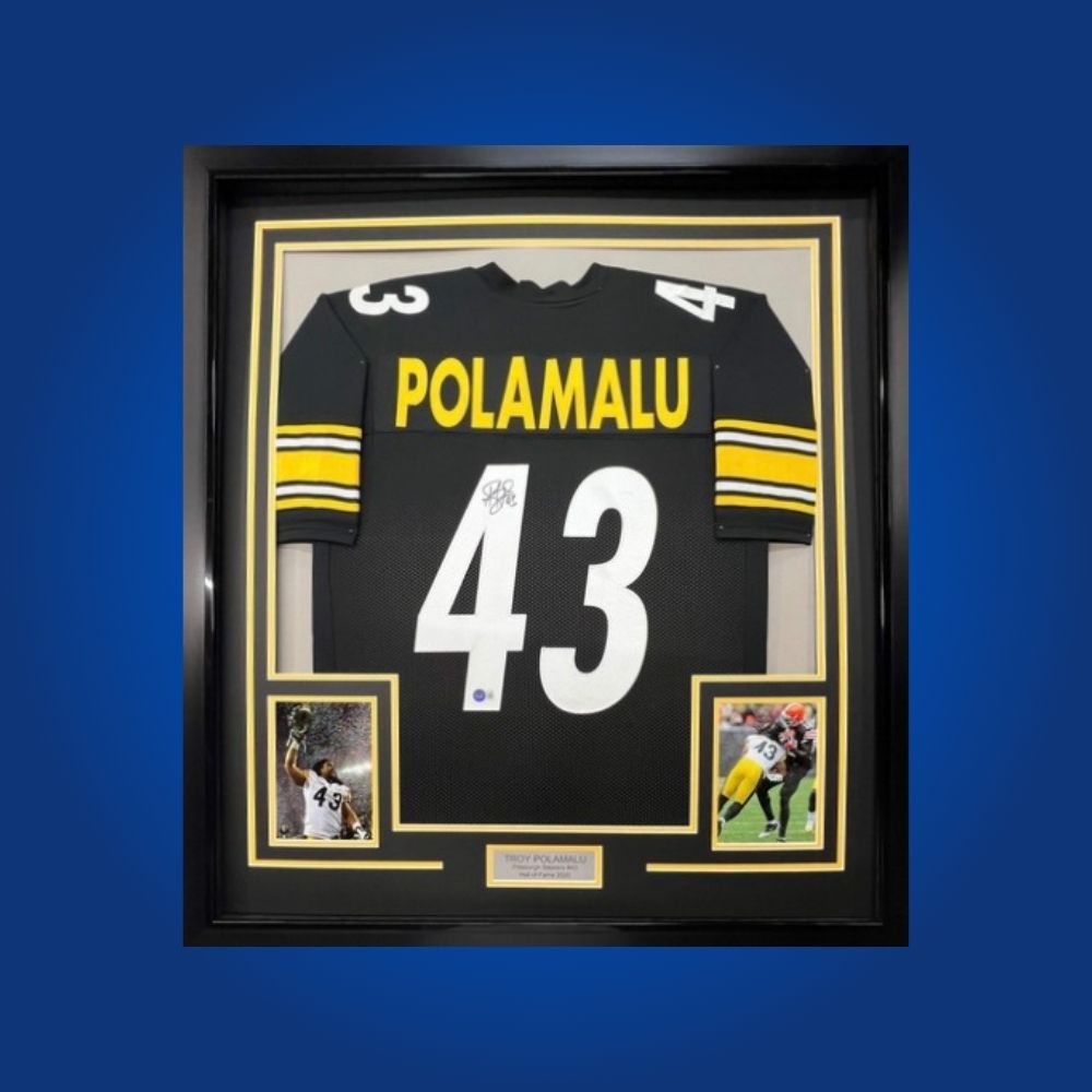 Autographed Pittsburgh Steelers custom jersey by Troy Polamalu with Certificate of Authenticity.