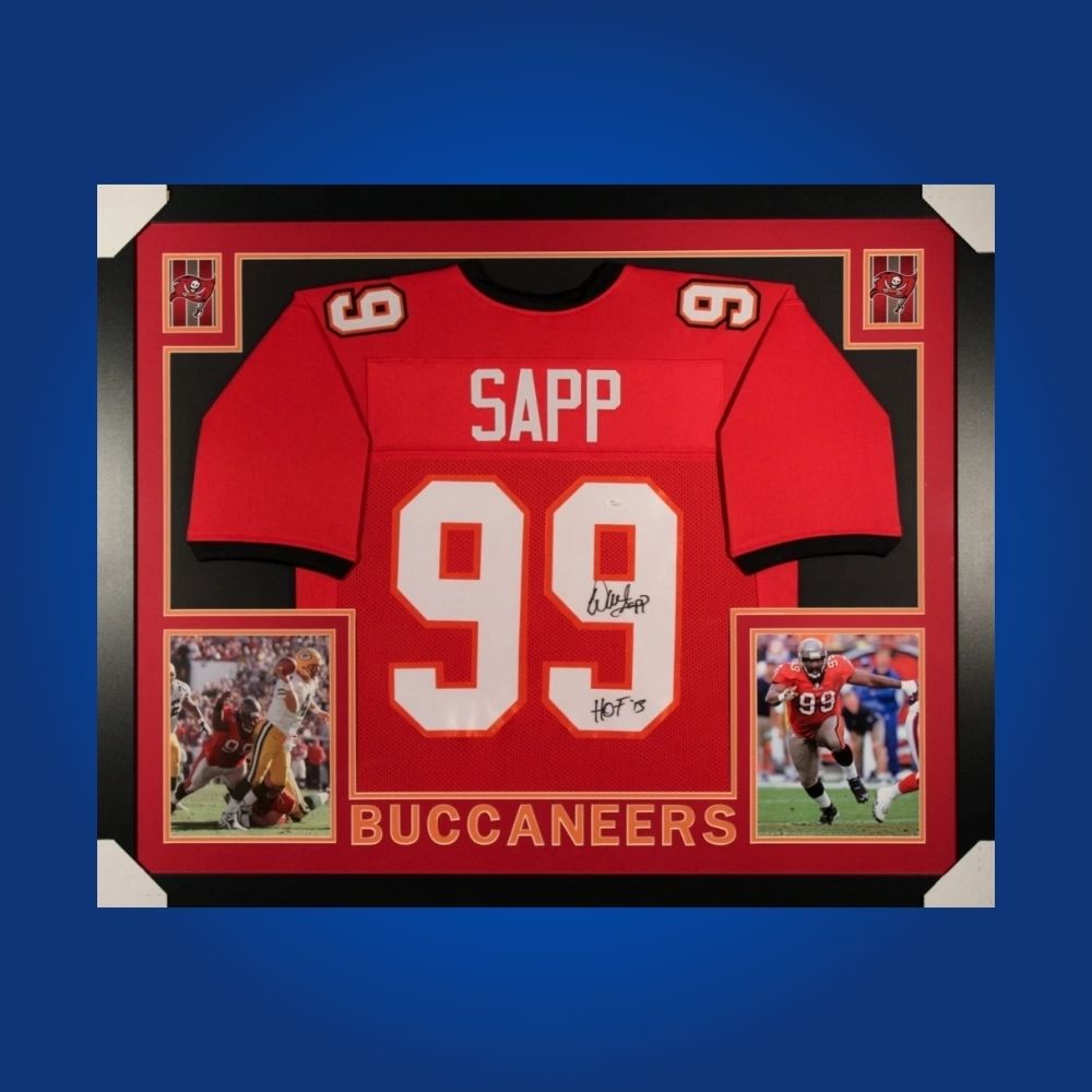 Autographed Tampa Bay Buccaneers custom jersey by Warren Sapp with Certificate of Authenticity.
