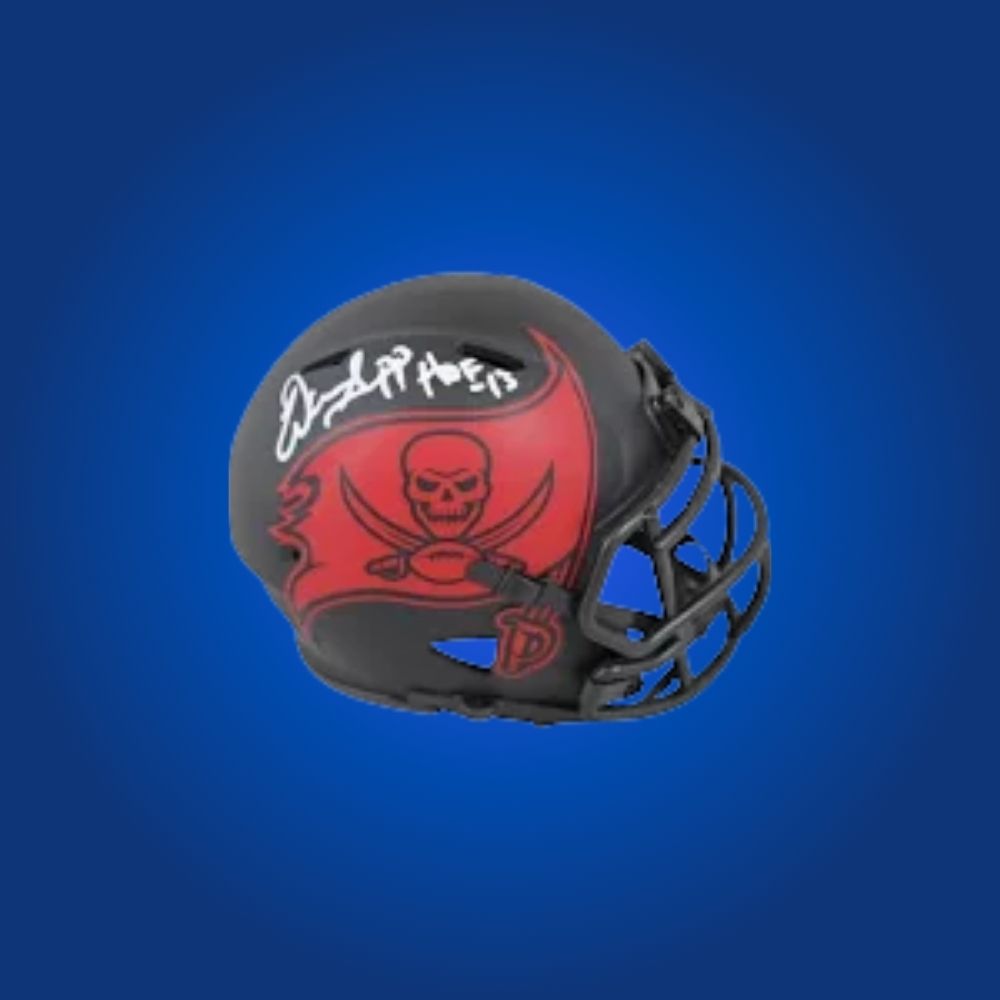 Tampa Bay Buccaneers mini helmet signed by Warren Sapp with Certificate of Authenticity.