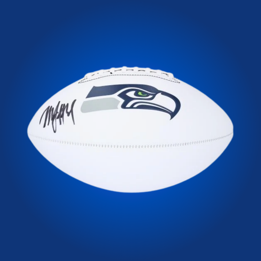 Marshawn Lynch signed Seattle Seahawks logo football, with his autograph, a classic piece for Seahawks fans.