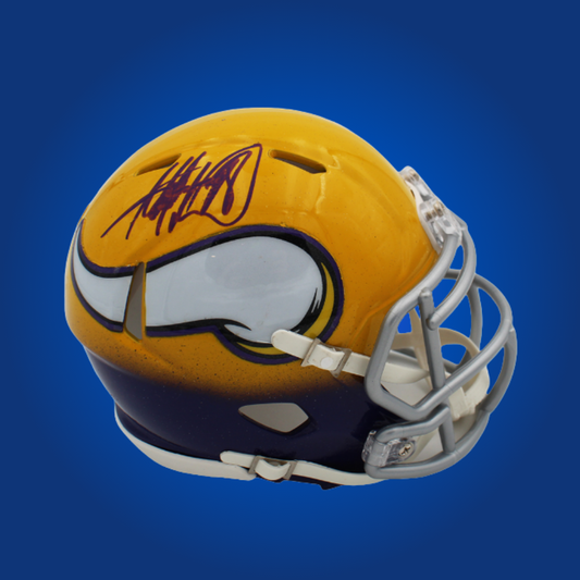 Minnesota Vikings mini helmet signed by Adrian Peterson with Certificate of Authenticity