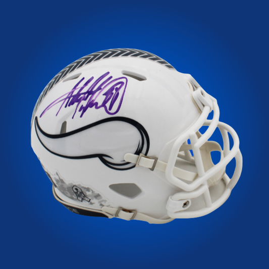 Minnesota Vikings mini helmet signed by Adrian Peterson with Certificate of Authenticity.