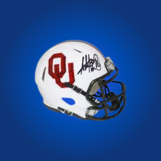 Adrian Peterson signed Oklahoma Sooners mini helmet—essential keepsake for Sooners fans and sports memorabilia collectors.