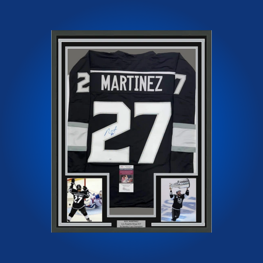 Alec Martinez’s signed full framed Los Angeles Kings black jersey is a tribute to his pivotal role in the team’s Stanley Cup victories and a memorable collectible for fans.