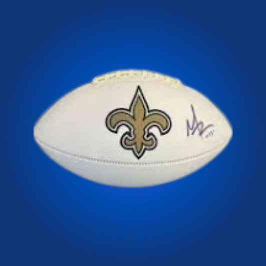 Alvin Kamara-signed New Orleans Saints football, showing team logo and player autograph.