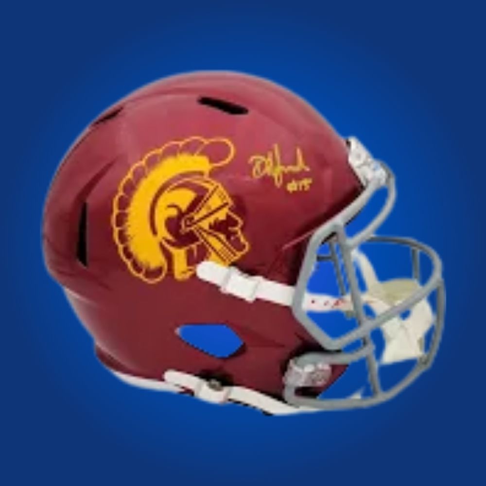 Autographed full size replica helmet by Amon-Ra St. Brown, standout USC Trojans wide receiver and NFL star, displayed on a clean white backdrop for visual emphasis. Ideal for collectors and USC fans. SportsMarkets memorabilia product image.
