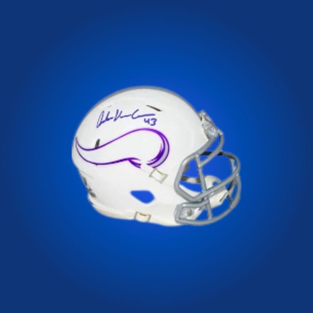 Minnesota Vikings mini helmet signed by Andrew Van Ginkle with Certificate of Authenticity.