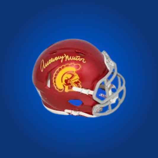 Anthony Munoz signed USC Trojans mini helmet—standout item for USC supporters and Munoz memorabilia fans.