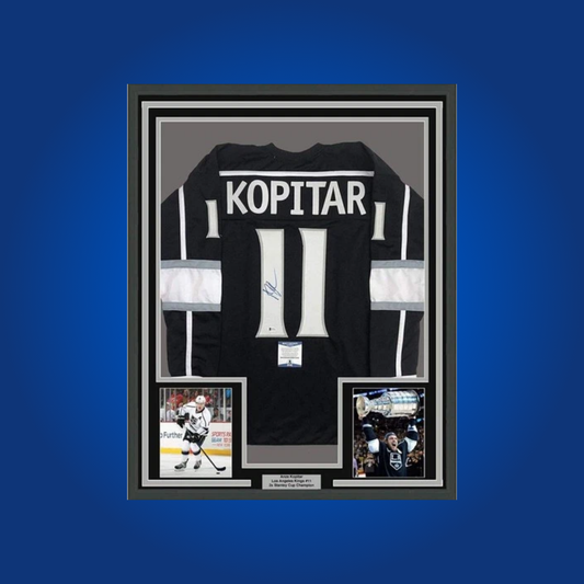 Anze Kopitar’s autographed full framed Los Angeles Kings black jersey celebrates the captain’s leadership and championship pedigree, making it a staple for Kings memorabilia collections.