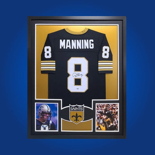 Autographed New Orleans Saints custom jersey by Archie Manning with Certificate of Authenticity.