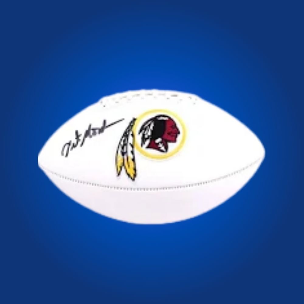 Art Monk signed Commanders logo football, featuring legendary receiver’s signature and franchise emblem.