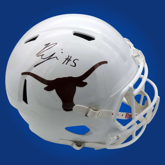 Autographed full size replica helmet by Bijon Robinson, Texas Longhorns star running back, featured on a neutral white background for clarity and emphasis. Excellent for collectors and Texas enthusiasts. SportsMarkets memorabilia photo.