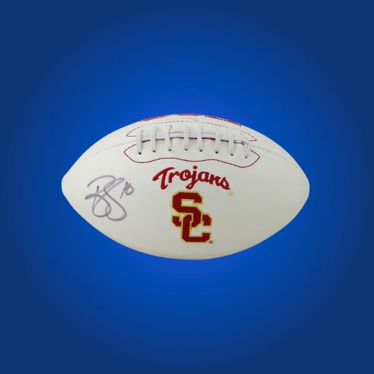 Autographed full size replica football by Brian Cushing, featuring USC Trojans white logo. Certified authentic, an excellent addition for Trojans fans and memorabilia collectors. Certificate of Authenticity included. Ball details may vary for catalog consistency.