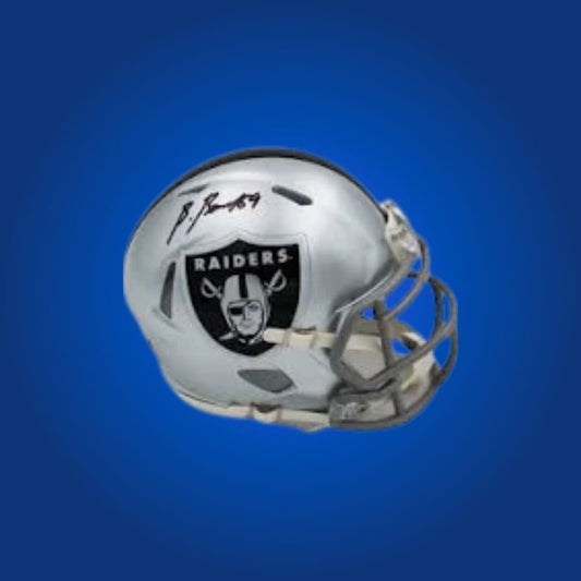 Las Vegas Raiders Silver Speed Mini Helmet signed by Brock Bowers, Certificate of Authenticity included