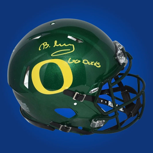 Autographed Oregon Ducks full size Authentic Helmet signed by Bucky Irving, displayed against a clean white background. SportsMarkets memorabilia photo.