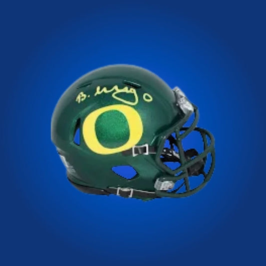 Bucky Irving signed Oregon Ducks mini helmet—must-have for Oregon supporters and sports memorabilia collectors.
