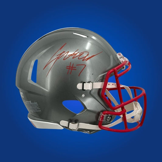 Autographed Ohio State Buckeyes full size Authentic Helmet signed by C.J. Stroud, displayed on a white background. SportsMarkets memorabilia image.
