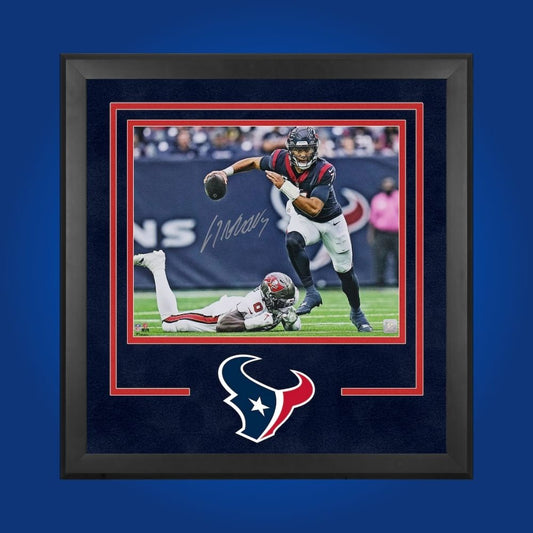 CJ Stroud hand-signed Houston Texans framed 16x20, showcasing signature and official team graphics. A unique collectible for Texans fans and Stroud memorabilia collectors. Includes Certificate of Authenticity. Images may differ for catalog uniformity.