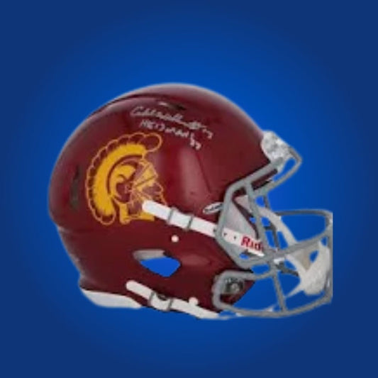 Autographed full size Authentic Helmet by Caleb Williams, dynamic USC Trojans quarterback and Heisman Trophy winner, displayed against a neutral white background. The perfect centerpiece for any collection. SportsMarkets memorabilia photo.