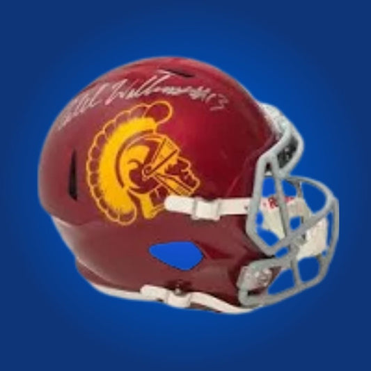 Autographed full size replica helmet by Caleb Williams, 2022 Heisman Trophy winner and USC Trojans standout quarterback, displayed against a clean white background. Ideal for memorabilia collectors and Trojans fans. SportsMarkets product photo.