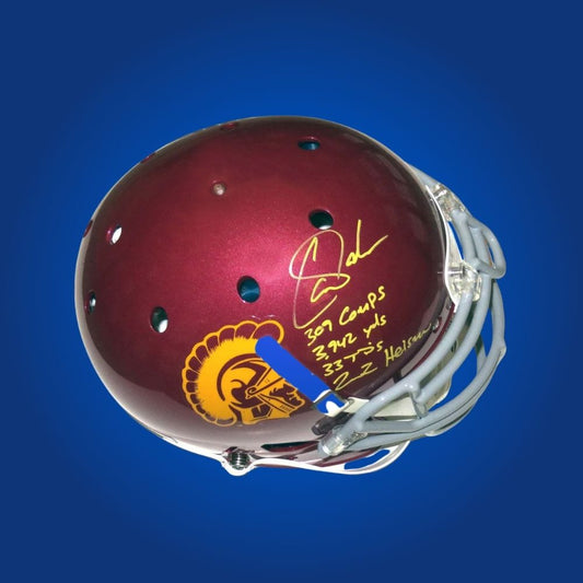 Autographed full size Authentic Helmet by Carson Palmer, celebrated USC Trojans quarterback and Heisman winner, set on a pristine white background for optimal presentation. A must-have for Trojans supporters. SportsMarkets product photo.
