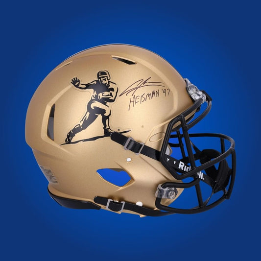 Autographed Michigan Wolverines full size Authentic Helmet signed by Charles Woodson, displayed against a white background. SportsMarkets collectible product image.